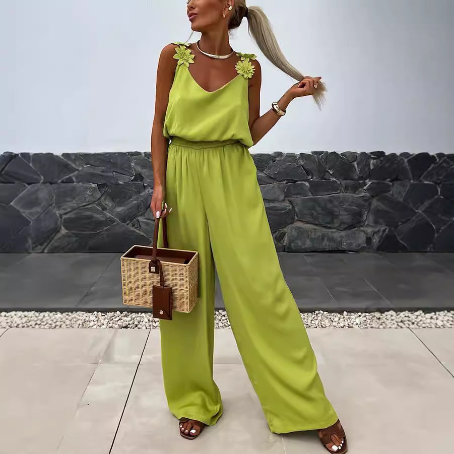 Satijnen dames jumpsuit met bloemenbandjes en pasvorm – Elanory