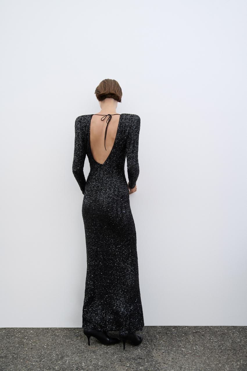 Maxi glitterjurk met open rug en lange mouwen – Yara