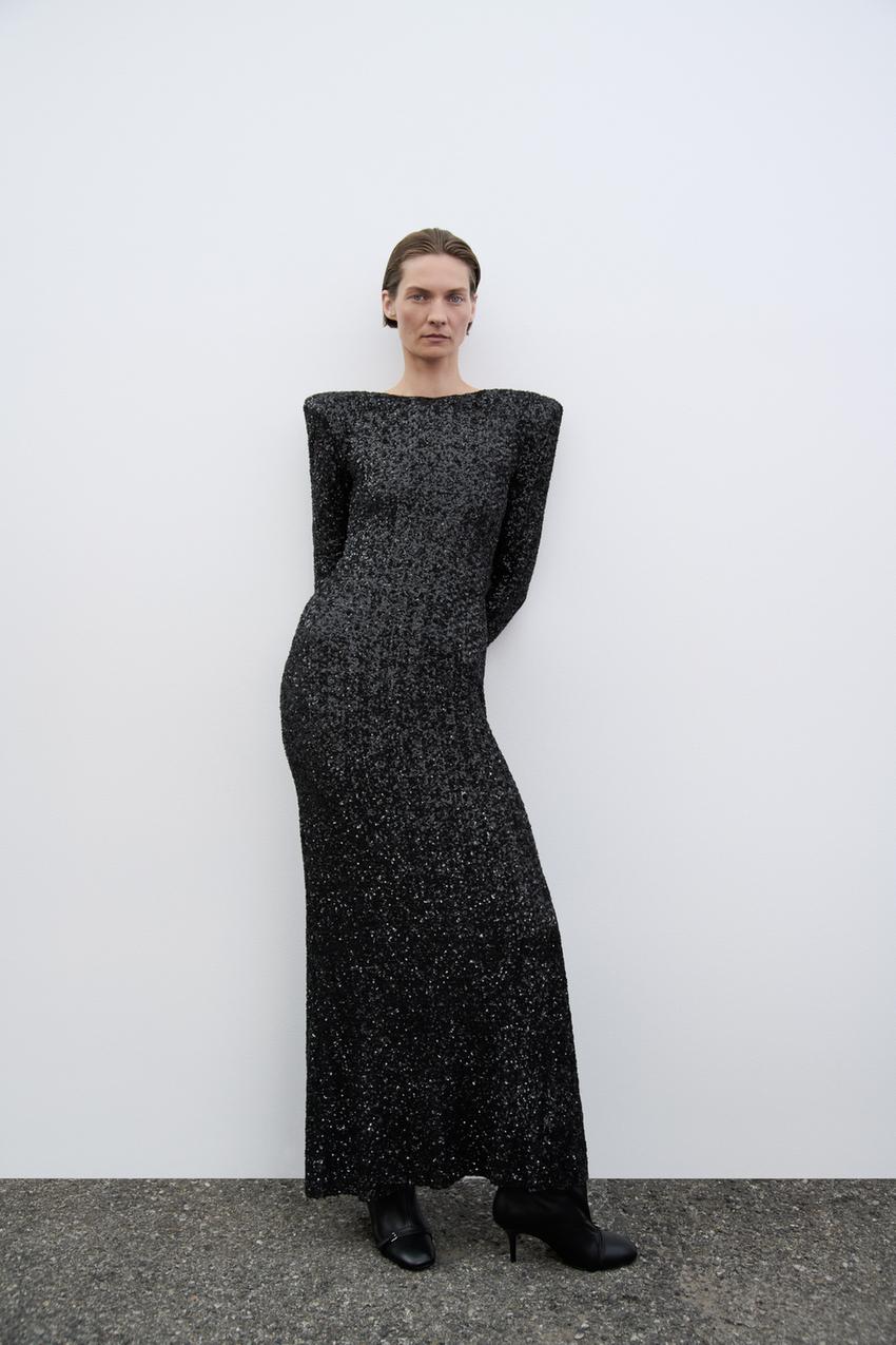 Maxi glitterjurk met open rug en lange mouwen – Yara
