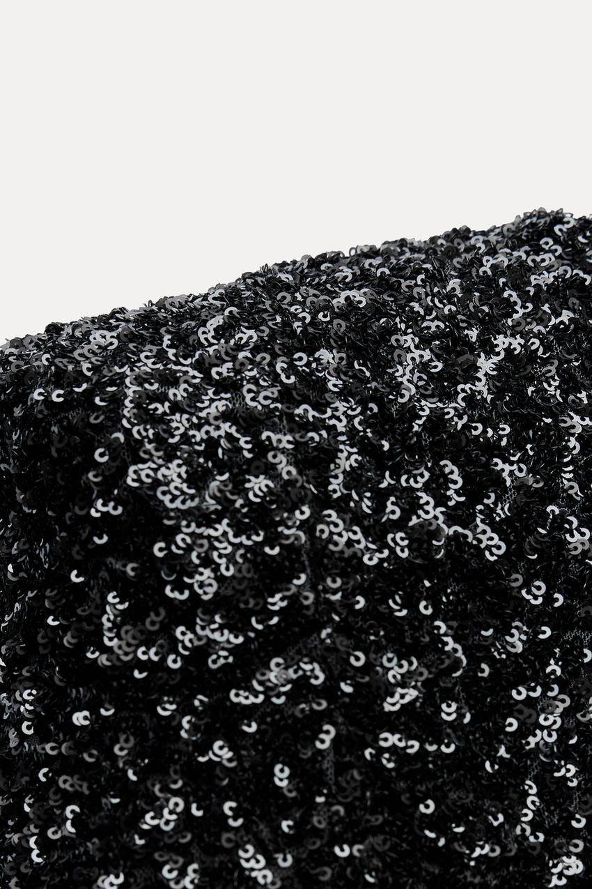 Maxi glitterjurk met open rug en lange mouwen – Yara