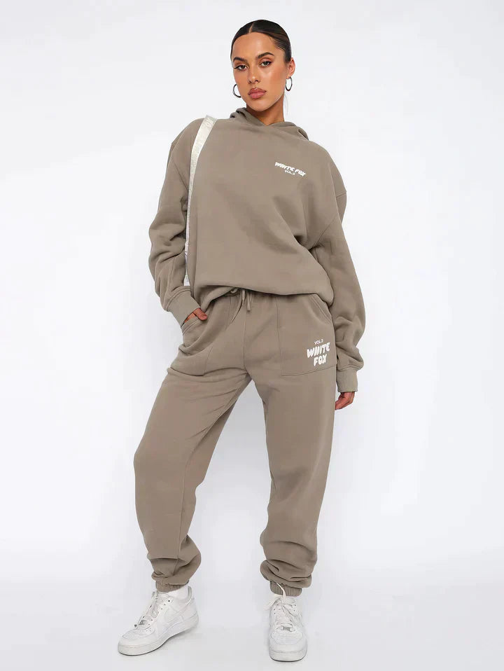 Getailleerd dames trainingspak met hoodie – Lianne