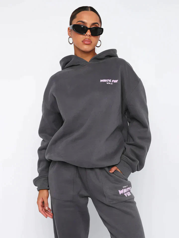 Getailleerd dames trainingspak met hoodie – Lianne