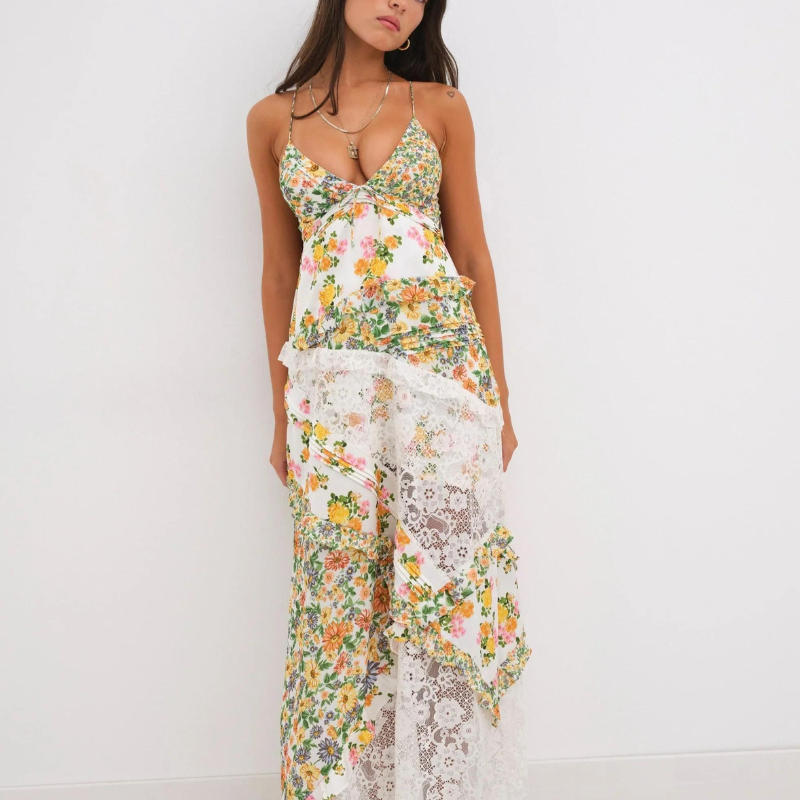 Bloemenjurk met diepe hals en patchworkdetails – Fleur