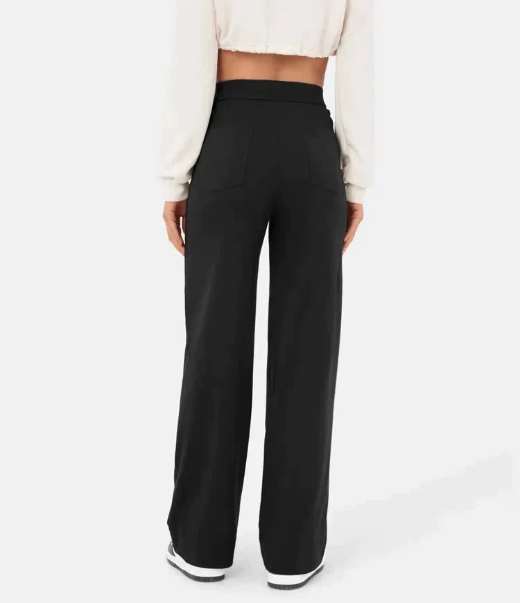 High waisted damesbroek elastisch met zakken en knoop – Zoe