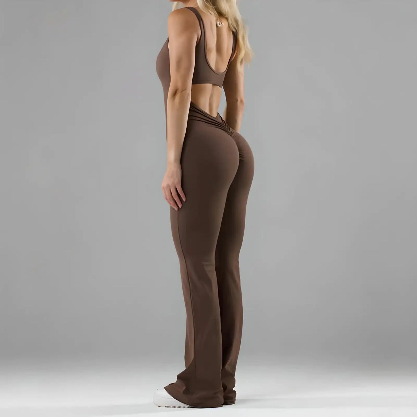 Elegante dames jumpsuit met flair en open rug – Selina