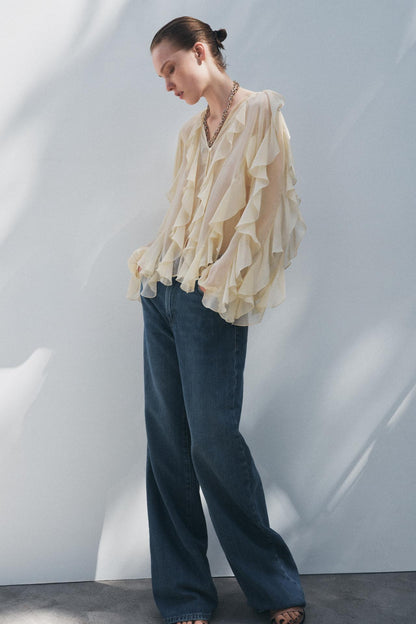 V-hals blouse met volants en luchtige pasvorm – Selina