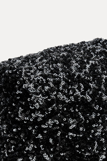 Maxi glitterjurk met open rug en lange mouwen – Yara