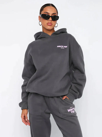 Getailleerd dames trainingspak met hoodie – Lianne