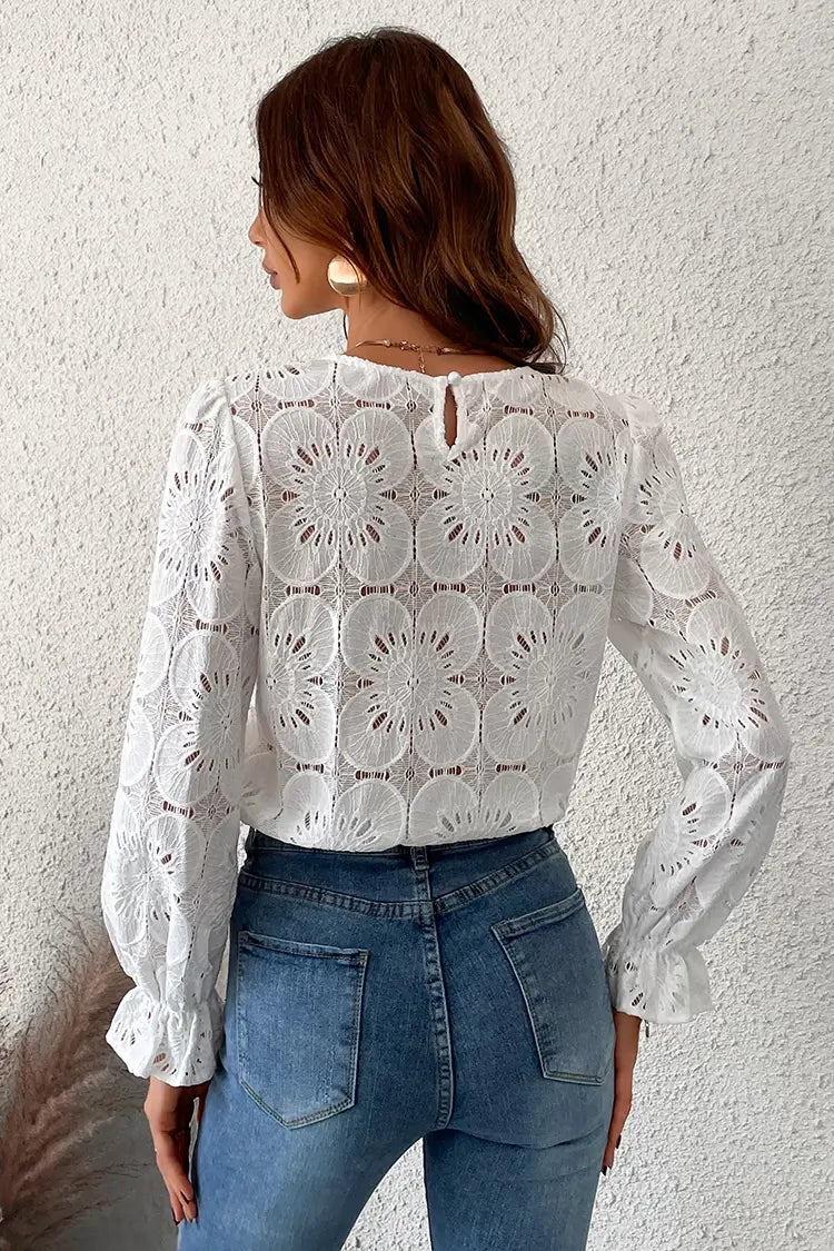 Witte bloemenblouse met trompetmouwen – Elise