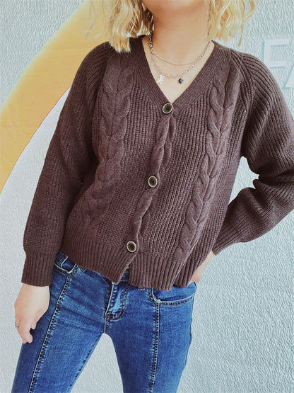 Kabelgebreid damesvest met V-hals en knoopsluiting – Olivia