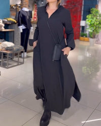Relaxed maxi jurk met split en reverskraag – Isalda