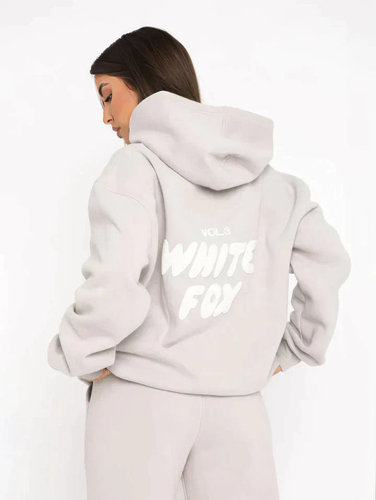 Getailleerd dames trainingspak met hoodie – Lianne