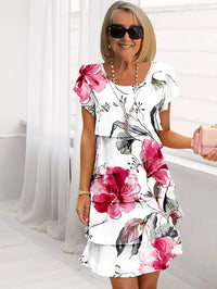 Maxi bloemenjurk met ronde hals en lagen – Gisella