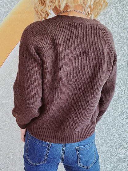 Kabelgebreid damesvest met V-hals en knoopsluiting – Olivia