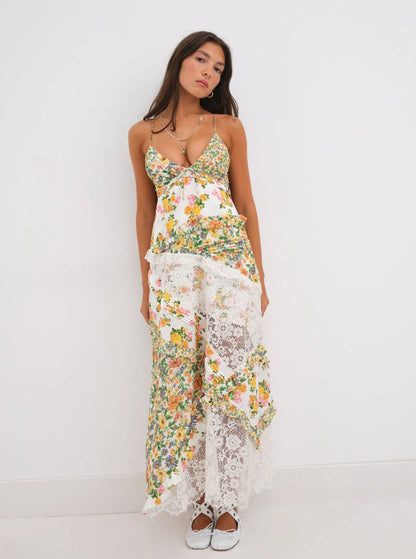 Bloemenjurk met diepe hals en patchworkdetails – Fleur