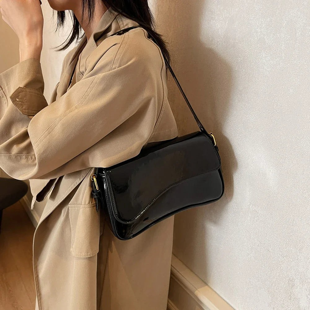 Glanzende schoudertas met golvend design voor dames – Veluna