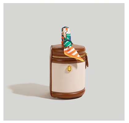 Leren bucket bag met scarf-handle en goudaccent – Virelle
