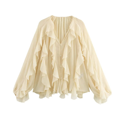 V-hals blouse met volants en luchtige pasvorm – Selina