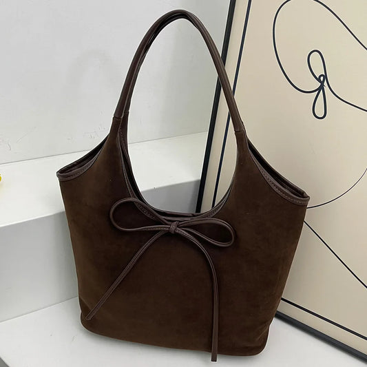 Vegan suède schoudertas met strikdetail – Alessa