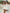 Elegante damesjurk met knoopdetail en slanke pasvorm – Ravina
