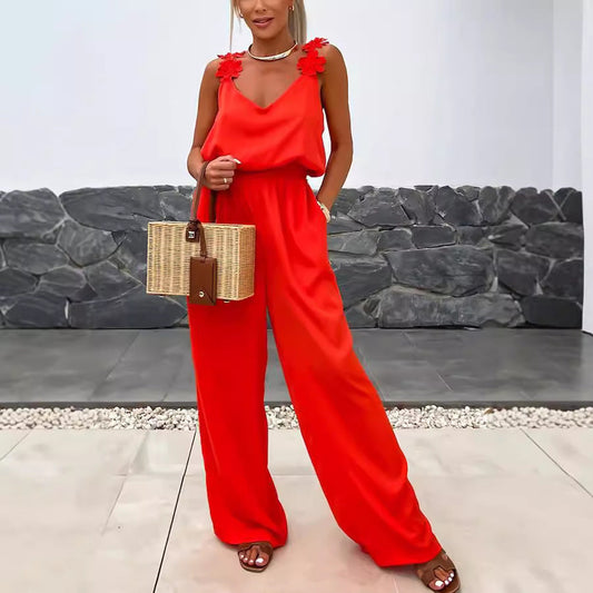 Satijnen dames jumpsuit met bloemenbandjes en pasvorm – Elanory