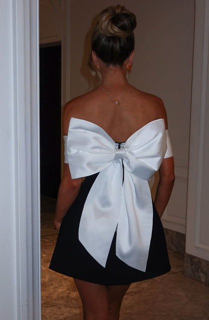 Korte off shoulder feestjurk met strik dames – Lotte