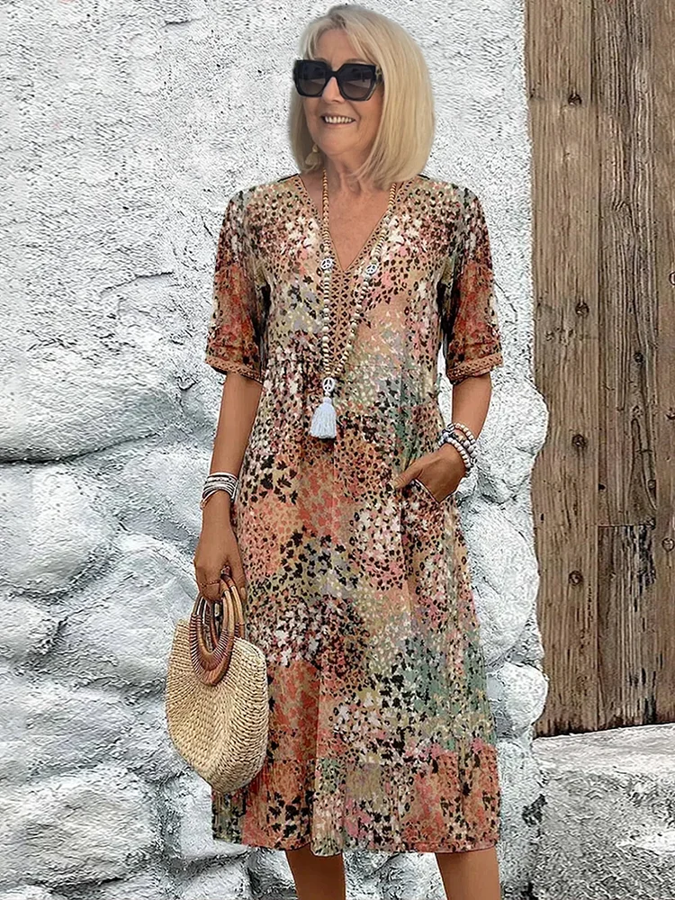 Dames midi-jurk met print en elegante V-hals – Mireille
