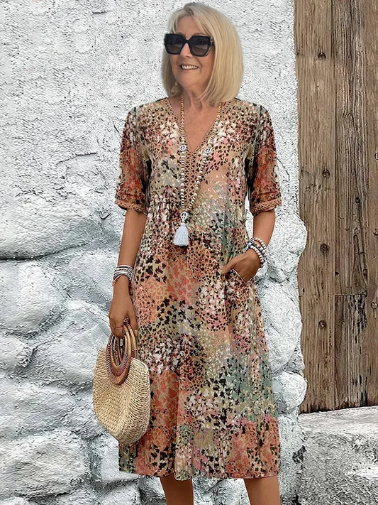 Dames midi-jurk met print en elegante V-hals – Mireille
