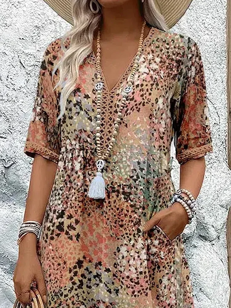 Dames midi-jurk met print en elegante V-hals – Mireille