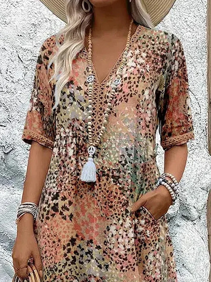 Dames midi-jurk met print en elegante V-hals – Mireille