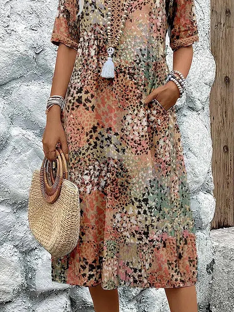 Dames midi-jurk met print en elegante V-hals – Mireille