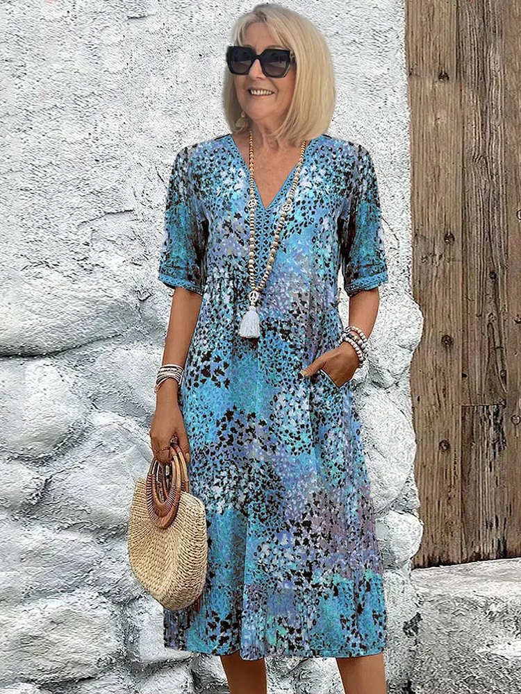 Dames midi-jurk met print en elegante V-hals – Mireille