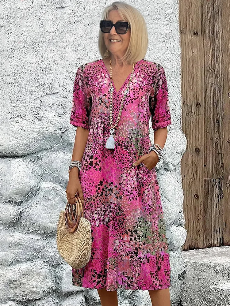 Dames midi-jurk met print en elegante V-hals – Mireille