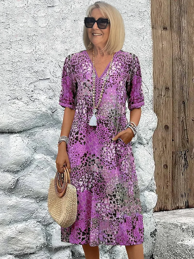 Dames midi-jurk met print en elegante V-hals – Mireille