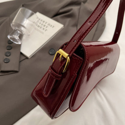Glanzende schoudertas met golvend design voor dames – Veluna
