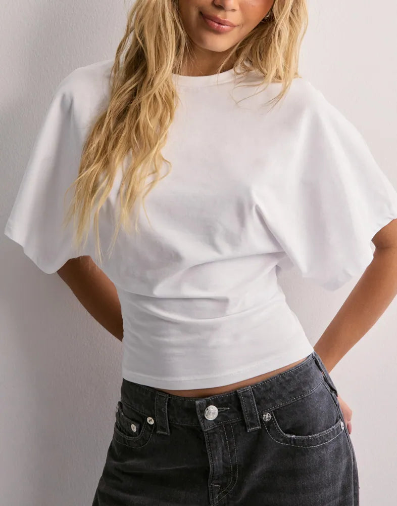 Trendy dames top met taille-accent en stijl – Lotte
